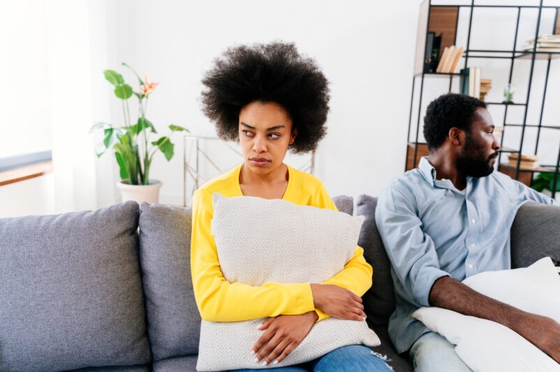 black couple having discussion home relationship crisis