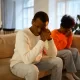 family conflict unhappy african couple sit separate couch upset thinking breakup divorce 165285 5181 1536x1024 1