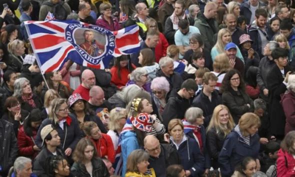 Thousands of people converge in London for the Coronation of King Charles III